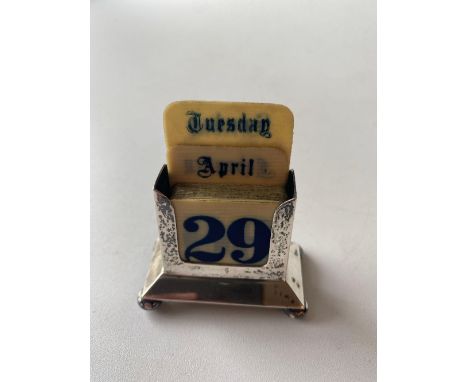 A small desk calendar on bun feet Birmingham by D F