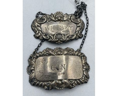 Two silver sprit labels Whiskey and Gin