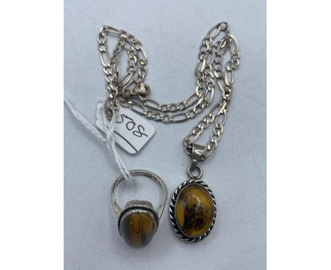 A silver tigers eye ring together with a silver figero link pendant necklace 18 inch