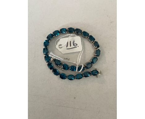 A pretty silver London topaz tennis bracelet 7 inch