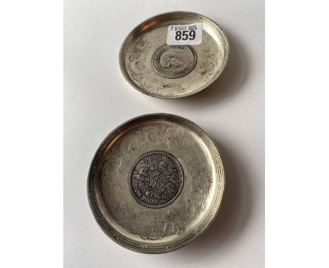 Two Chinese silver dishes with coin centres 3 ½ inches diameter 220m gms