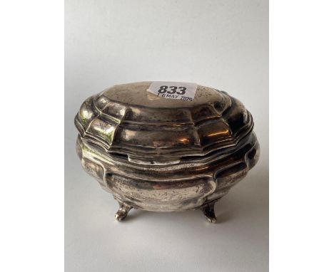 A Bombe shaped Edwardian tea caddy on scroll feet 5 inches wide London 1900 245 gms