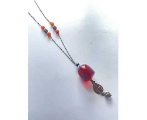 A fancy bead necklace with a large cherry amber bead pendant with drop large bead size approx. 30mm long approx. 26 gms