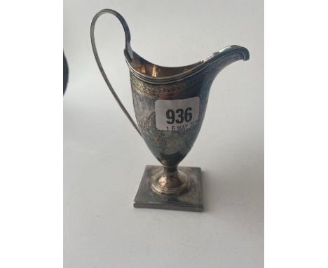 George III helmet shaped cream jug with bright cut decoration 6 in high . London 1796 By G C? 110 gms