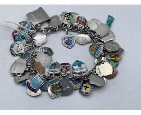 A heavy silver enamelled flag charm bracelet 77 gms