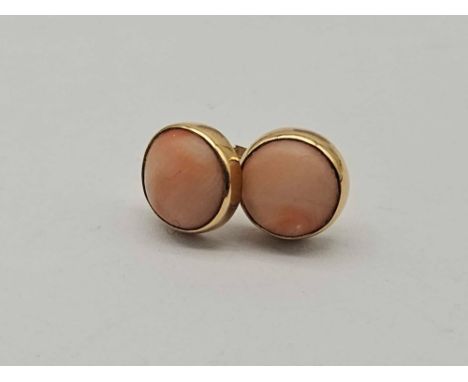 A pair of coral ear studs 1.4 gms