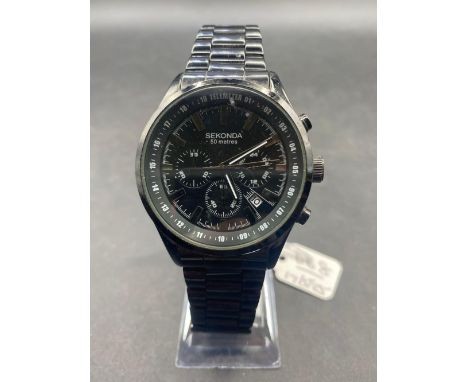 A SEKONDA multi dial black faced wrist watch with seconds sweep and date aperture