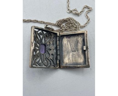 A silver heavy gauge opening locket with amethyst necklace 24 inch