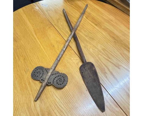 Carved wood spear on shaft and another  