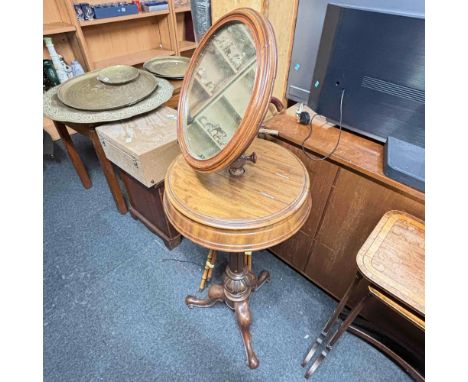 A Victorian mahogany shaving table with circular mirror two hinged flaps to platform on pedestal with three splayed legs