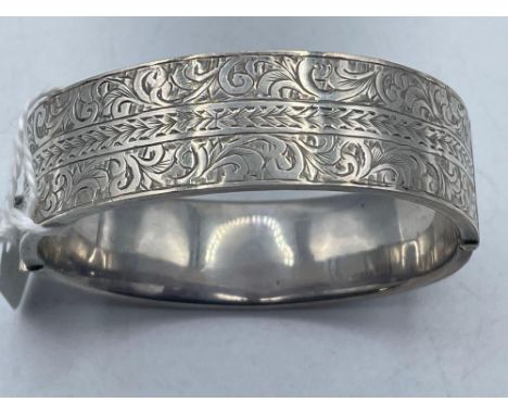 A silver bright cut bangle 22 gms
