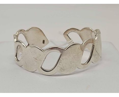 A silver bangle 38 gms