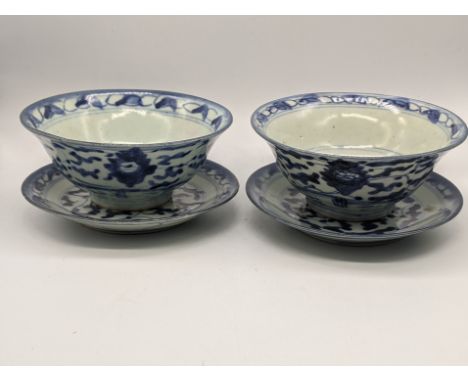 A pair of late 19th/early 20th century blue and white bowls and saucers, character marks to base, H.7cm D.15cm