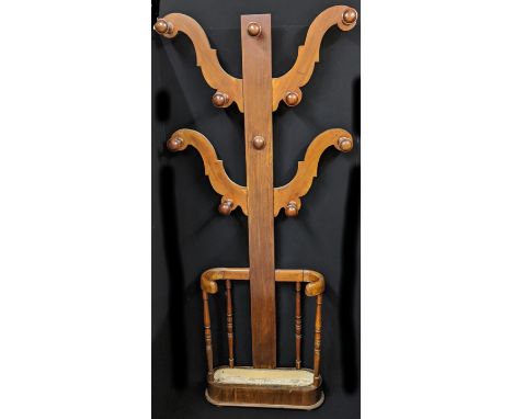 An Arts and Crafts mahogany hall coat and stick stand, early 20th century, H.202cm W.90cm