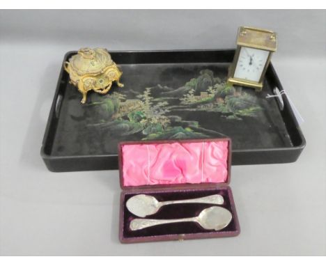 A painted black lacquer tray, a trinket box, pair of Aesthetic Movement engraved Epns spoons in a fitted case  and a brass ca