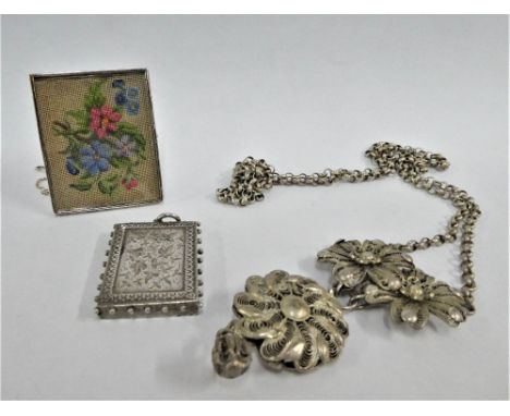 Victorian white metal foliate engraved locket / pendant, white metal framed tapestry brooch with glazed panel and an Indian w