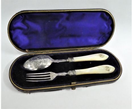 Victorian silver and mother of pearl fork and spoon set, Birmingham 1892, in fitted case together with another smaller spoon 