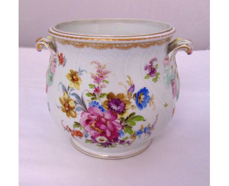 Dresden plant pot holder decorated with flowers and leaves, marks to the base, 18 x 23cm