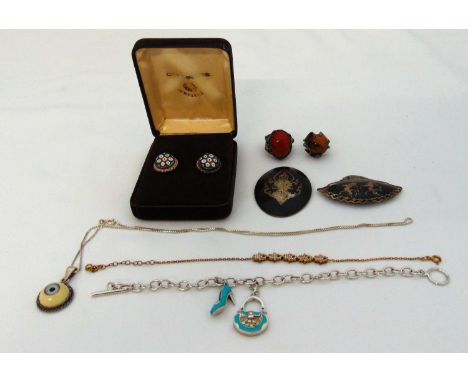 A quantity of silver jewellery including a pair of Caithness millefiori cufflinks, Siam Niello brooches and various necklaces