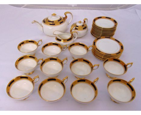 Aynsley blue and gold part tea service to include cups, saucers, a teapot, milk jug and sugar bowl (34)