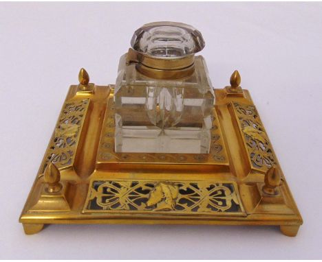 A Victorian brass and glass square inkstand with pierced borders, detachable glass inkwell on four bracket feet, 11 x 18 x 18