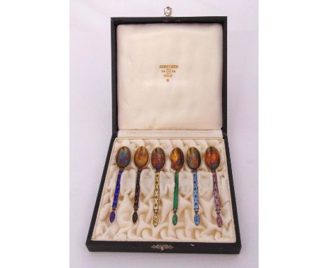 A cased set of six Norwegian yellow metal and enamel coffee spoons