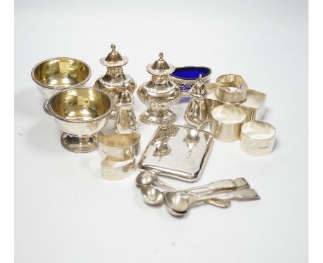 Sundry small silver including a pair of Victorian salts, condiments, napkin rings and an unusual flask?