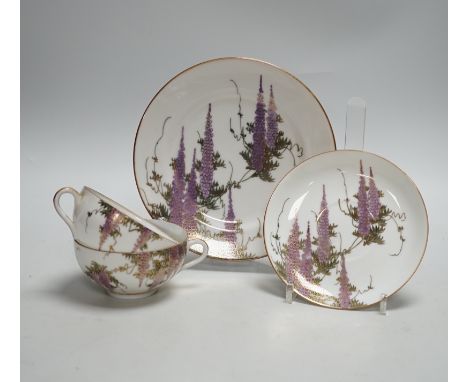 A Japanese eggshell part tea service with wisteria decoration, comprising of eight cups, eleven saucers and twelve tea plates
