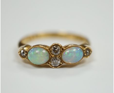 A George V 18ct gold, two stone white opal and four stone diamond chip set half hoop ring, Birmingham, 1917, size P, gross we