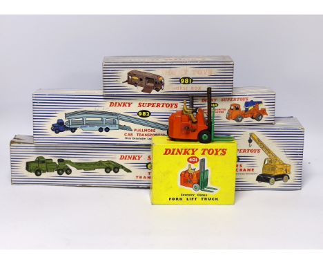 Six boxed Dinky Toys Including; a Pullmore Car Transporter with ramp (982), Mighty Antarctic Tank Transporter (660), BR Horse