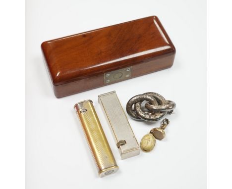 Two Dunhill lighters, largest 72mm, a yellow metal mounted scarab pendant, a gold plated and  white carnelian set fob seal, t
