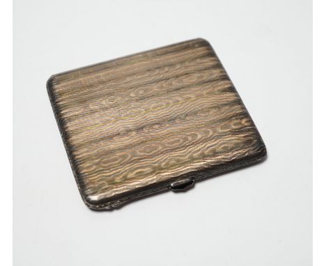 A 1920's silver cigarette case, with unusual engine turned finish, import marks for the London Chain Bag Company, London, 192