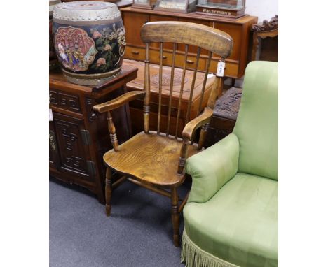 A Victorian elm and beech Windsor comb back armchair, width 55cm, depth 46cm, height 108cm