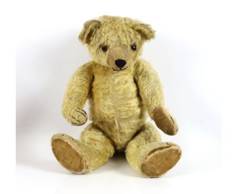 A large 1930's Chiltern bear, 53cm, with replaced nose stitching, some hair loss generally