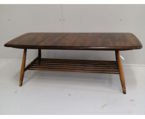 An Ercol rectangular elm coffee table, width 104cm, depth 45cm, height 36cm