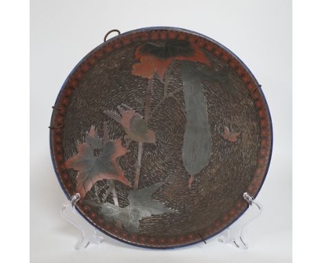A Japanese porcelain and cloisonné enamel dish, 27.5cm diameter