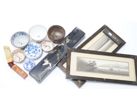 A group of Chinese and Japanese ceramics and works of art including two carved seals and tea bowls housed in a red lacquered 