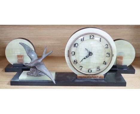 A French Art Deco green onyx clock garniture with Blue bird spelter mount, clock 46cm wide