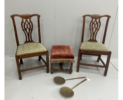 A pair of Chippendale style walnut dining chairs with drop in seats, an 18th century style walnut footstool and a pair of Vic