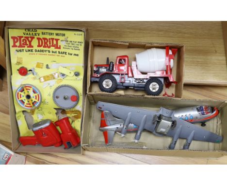 Three boxed 1960s battery operated plastic toys including a Rosho Toy tinplate and plastic airliner, a Marx Power-Brute Cemen