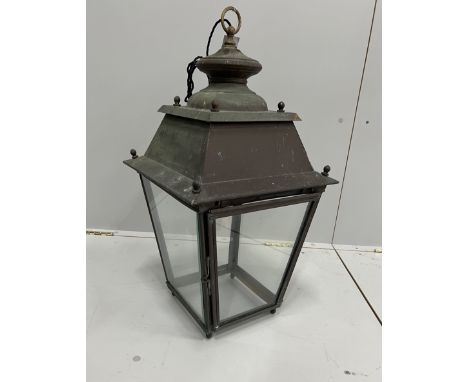 A 19th century French patinated copper lantern of tapered square form (rewired), width 37cm, height 68cm