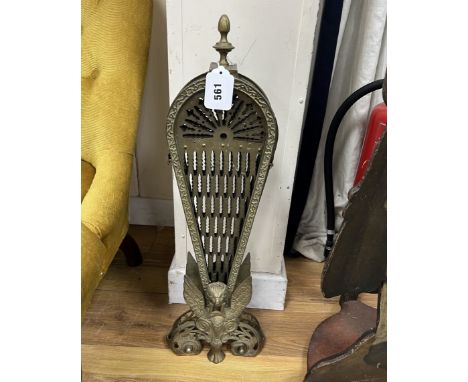 A brass fan shaped fire screen, 63cm high