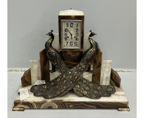 An Art Deco spelter and onyx peacock mantel clock, width 63cm, height 48cm