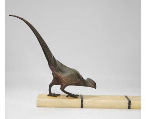 An Art Deco style spelter pheasant on rectangular onyx base, 55cm wide
