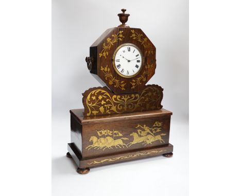A 19th century rosewood and cut brass mantel clock, inlaid heraldic horse racing panel, 53cm high