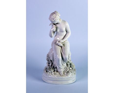 NINETEENTH CENTURY WHITE GLAZED PORCELAIN FIGURE, modelled as a seated naked female figure holding a jug and feeding a bird w