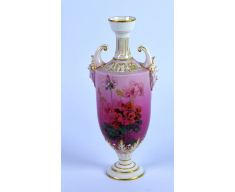 EARLY TWENTIETH CENTURY ROYAL WORCESTER PORCELAIN TWO HANLDED PEDESTAL VASE, of slender ovoid form with mask capped open scro