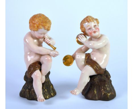 PAIR OF ROYAL WORCESTER PORCELAIN FIGURES OF CHERUB MUSICIANS, each modelled seated and playing an instrument, 6” (15.2cm) hi
