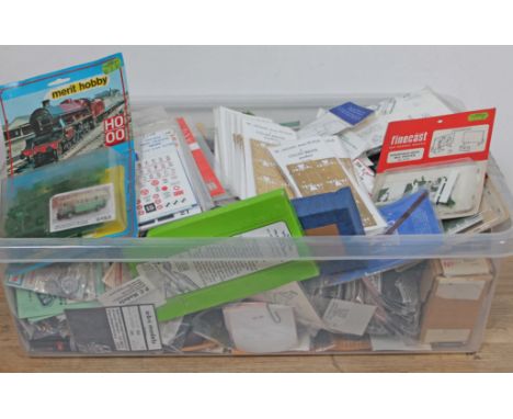 A box containing a large quantity of model railway kits including Wills Finecast, Merit, a.b.s, Cooper Craft, Ken Line, Colin