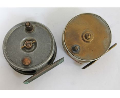 Two vintage fishing reels.